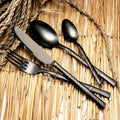 Canisse - Juego de cubiertos negro mate de 16 piezas - Acero inoxidable - Negro