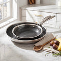 Hera - Set di 2 Padelle Triplex Antiaderenti - 20/28Cm - Nero/Argento