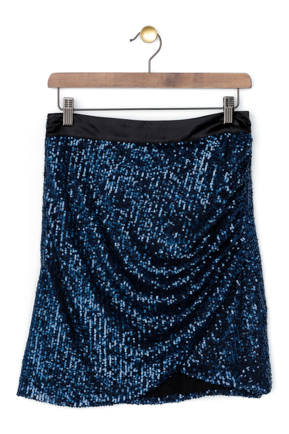 La falda azul con purpurina de Harry