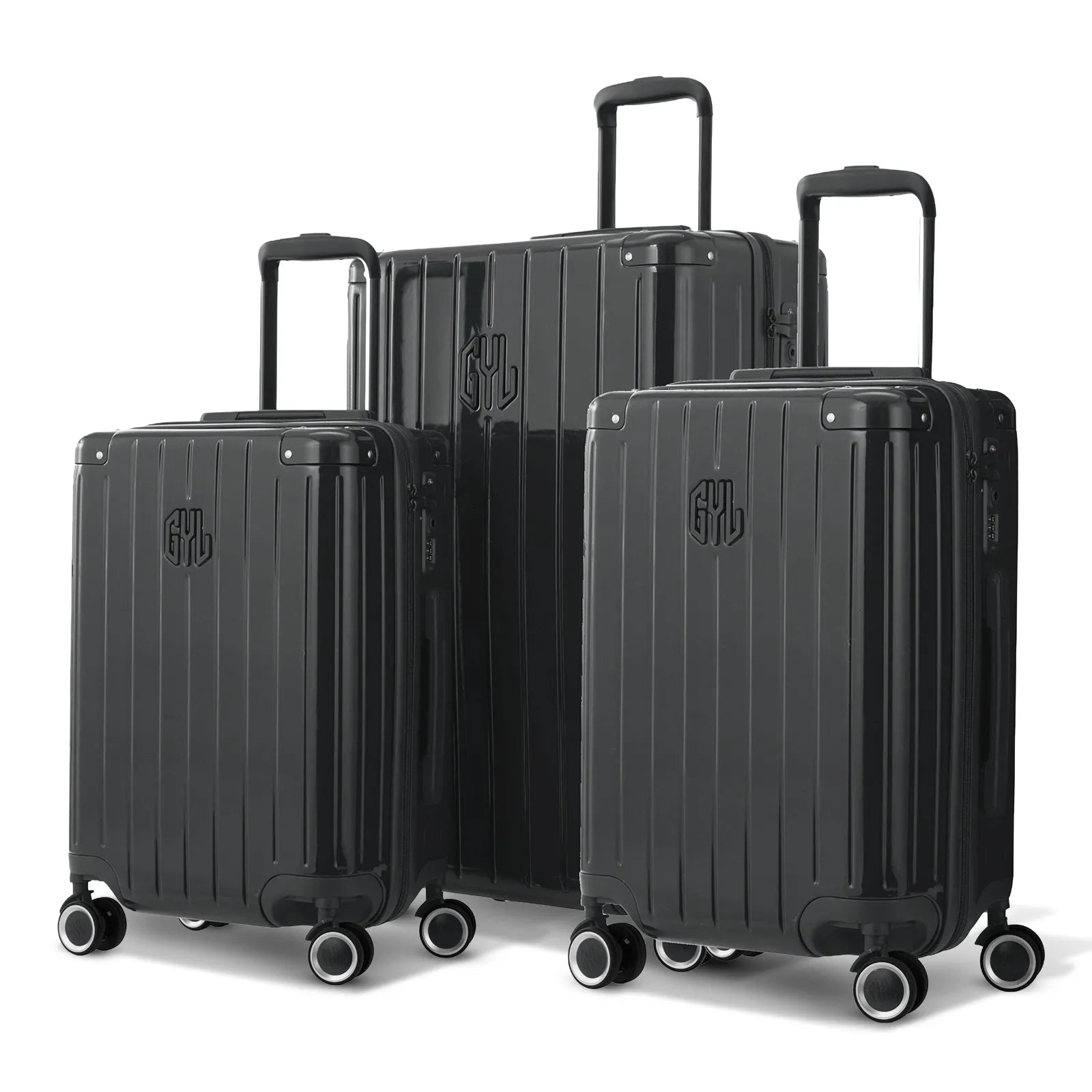 Trio de valises rigides GYL Intemporelle gris foncé avec coques nervurées et poignées télescopiques.  #couleur_gris foncé