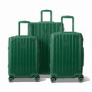 Trois valises rigides GYL Intemporelle sapin, format cabine et soute, avec poignée trolley déployée.  #couleur_sapin