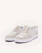 Zapatillas blancas y violeta claro de piel