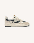Sneaker nere e dorate in pelle