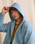 Sudadera con cremallera y capucha azul grisáceo
