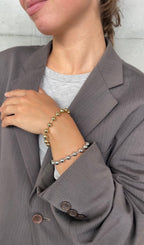 Bracciale in metallo con perla