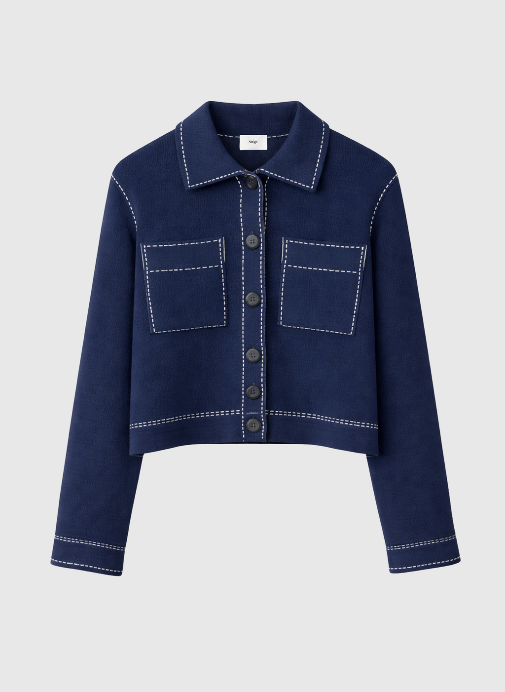 An'ge – Vest Leclint Marine, kort marineblauw gebreid jasje met witte stiksels, vooraanzicht