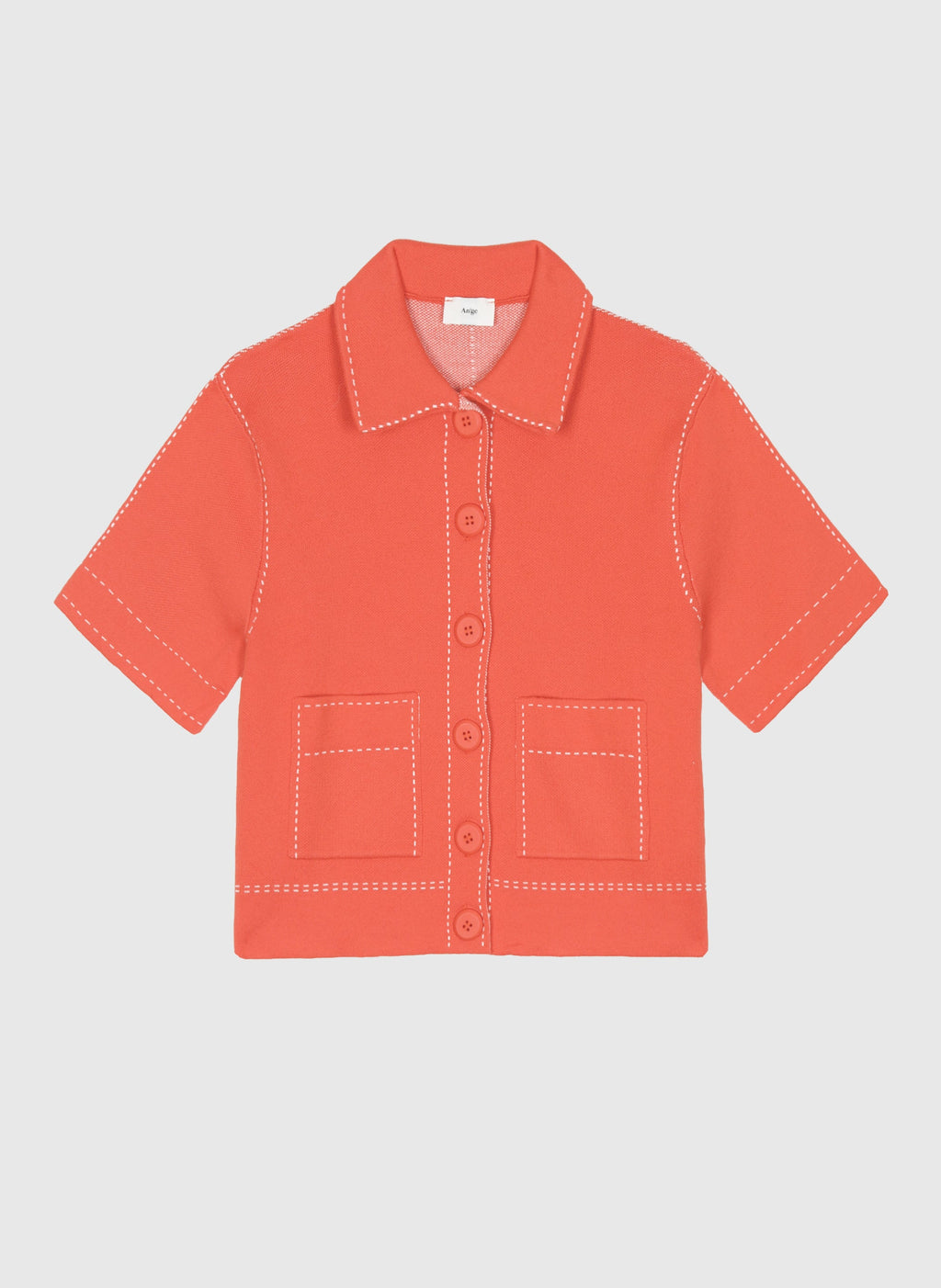 An'ge – Gilet Lebilly Piment, chemise corail à manches courtes et surpiqûres blanches, vue de face