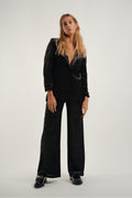 Los pantalones dorados Debbie Léo