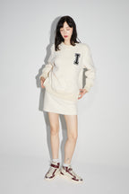 La sudadera blanca Harper Preppy
