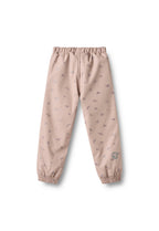 Pantaloni impermeabili termici Um - Fiori rosa appassiti