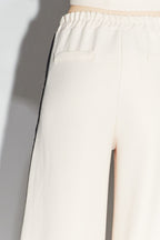Los pantalones de fumar Neil
