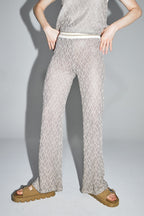 Le Pantalon Edwin Tricot Géo Ajouré Doré Noir Fabriqué En Italie