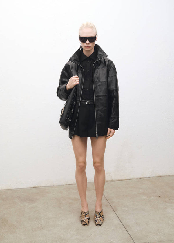 Cappotto oversize in pelle patchwork