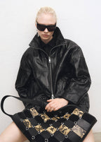 Cappotto oversize in pelle patchwork
