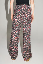 Los pantalones Max con estampado floral gitano rojo y rosa