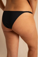 anja culotte basse l'époustouflante noir plan rapproché dos