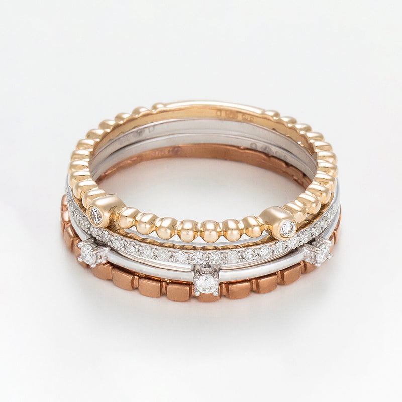 Set of 4 "Harmony" Rings with 0.16Ct/27 Diamonds - 375/1000 Tricolor Gold