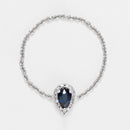 "Blue Tear" Chain Ring with 0.05/15 Diamond and 0.25 Sapphire - 375/1000 White Gold