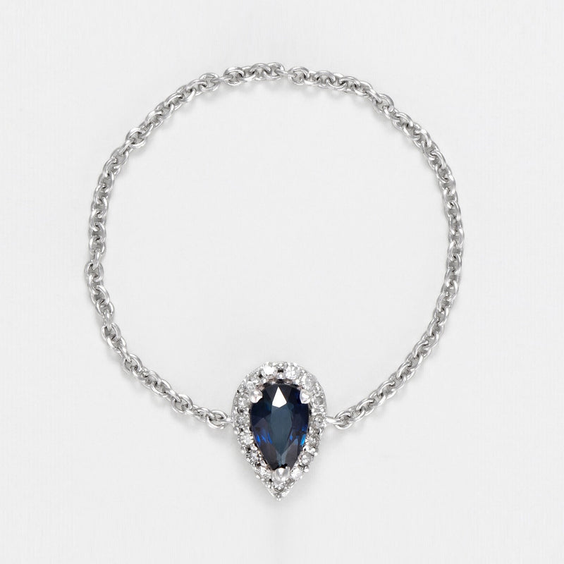 "Blue Tear" Chain Ring with 0.05/15 Diamond and 0.25 Sapphire - 375/1000 White Gold