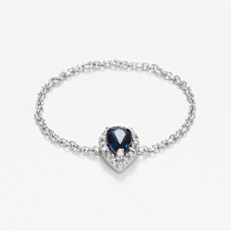 "Blue Tear" Chain Ring with 0.05/15 Diamond and 0.25 Sapphire - 375/1000 White Gold
