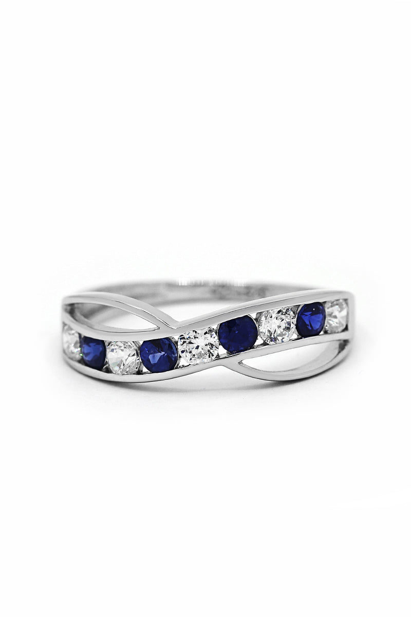 Ring "Océanos" 375/1000 witgoud en saffier/zirkonia