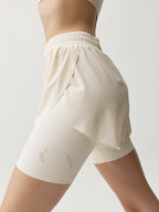 Short Bikila - Tiza Blanca - Mujer
