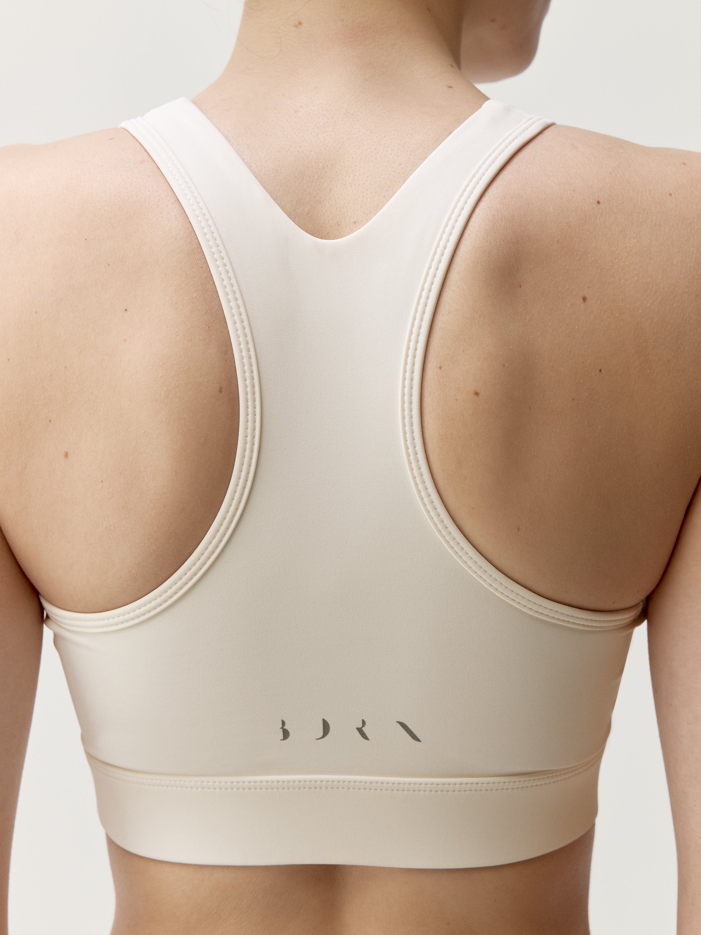 Top Bikila - Tiza Blanca - Mujer