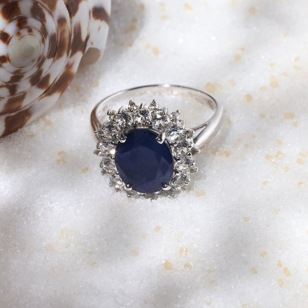 Diamanta – Anello "Soleil Bleu", anello in argento con zaffiro blu ovale circondato da piccoli diamanti