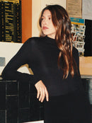 Body de manga larga con ondas oscuras y espalda descubierta