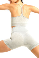 Beige gray racerback sports bra seen from behind