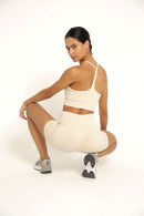 Cream Racerback Sports Bra seen from the back