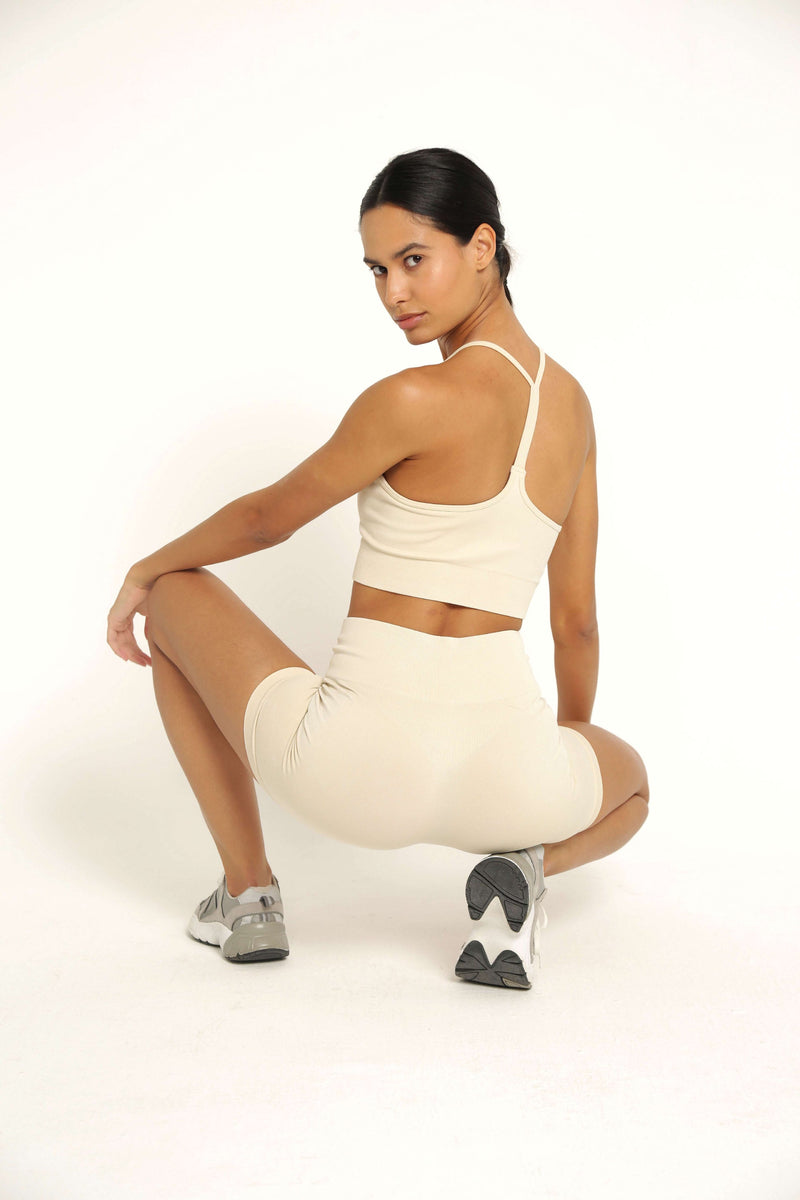 Cream Racerback Sports Bra seen from the back