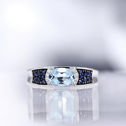 Bague "Azur" Diamants 0,04/8 Topaze Bleue 1,16/1 & Saphir 0,25/14 - Or Blanc 375/1000