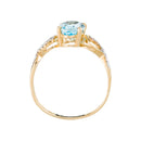 Anillo "Tobago" D0.04/14 y Topacio Azul 1.70/1 - Oro amarillo 375/1000