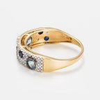 Anello "Majunga" D 0,0035/16 Zaffiro 0,1/4 Topazio blu 0,176/3 - Oro giallo 375/1000