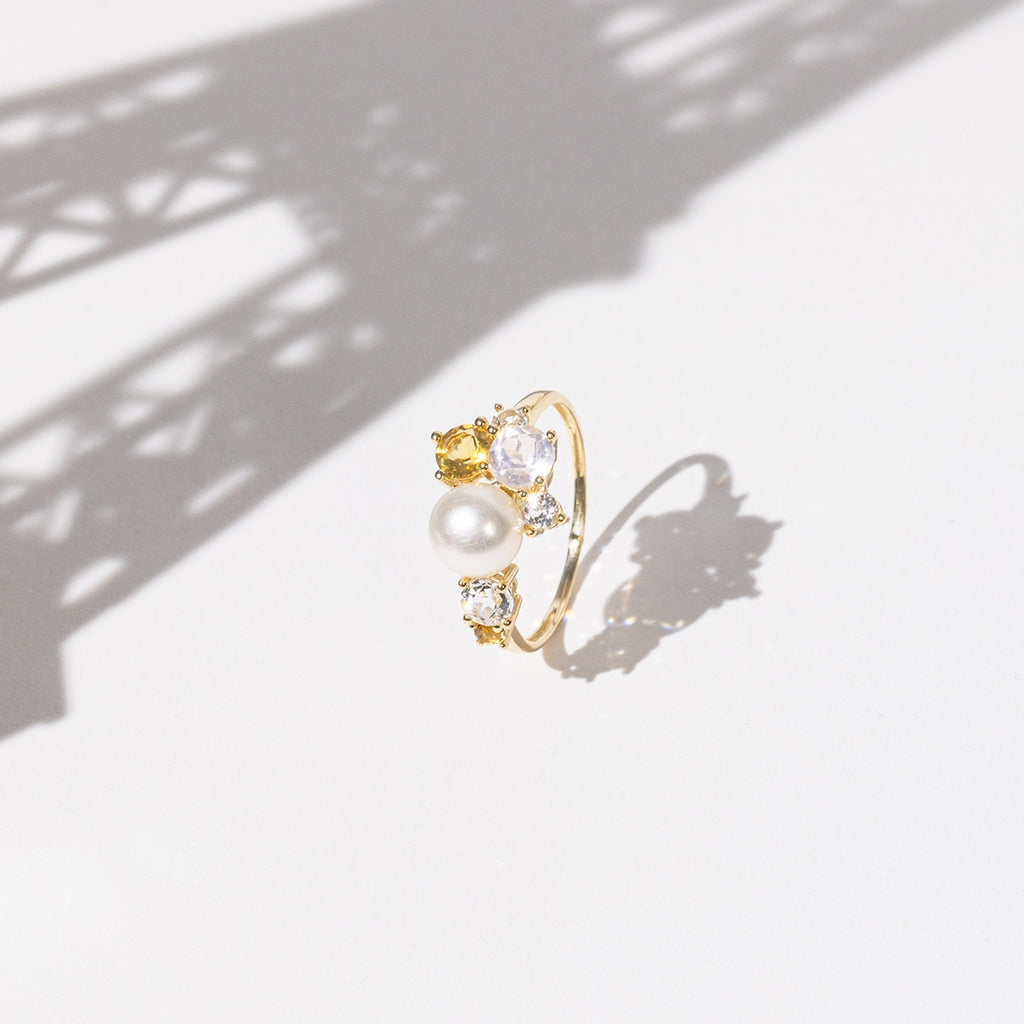 Anello "Pikine" Topazio bianco 0,67/3 Citrino 0,53/2 Quarzo rosa 0,60/1 Perla 1 - Oro giallo 375/1000