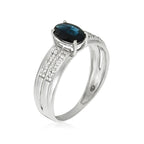 Anello "Rimatara" con diamanti 0,05 ct/16 + zaffiro 1 ct/1 - Oro bianco 375/1000