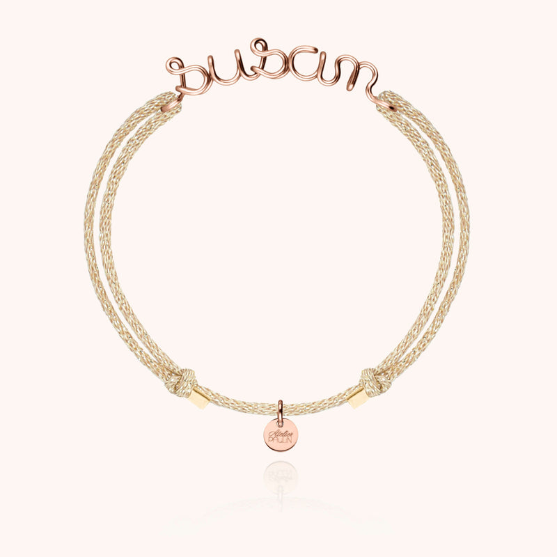 Bracelet Cordon Lurex Personnalisé porté au poignet — or rose laminé livraison express sécurisée