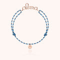 Bracelet Cordon Slim Knot Personnalisé porté au poignet — or rose laminé livraison soigneuse garantie