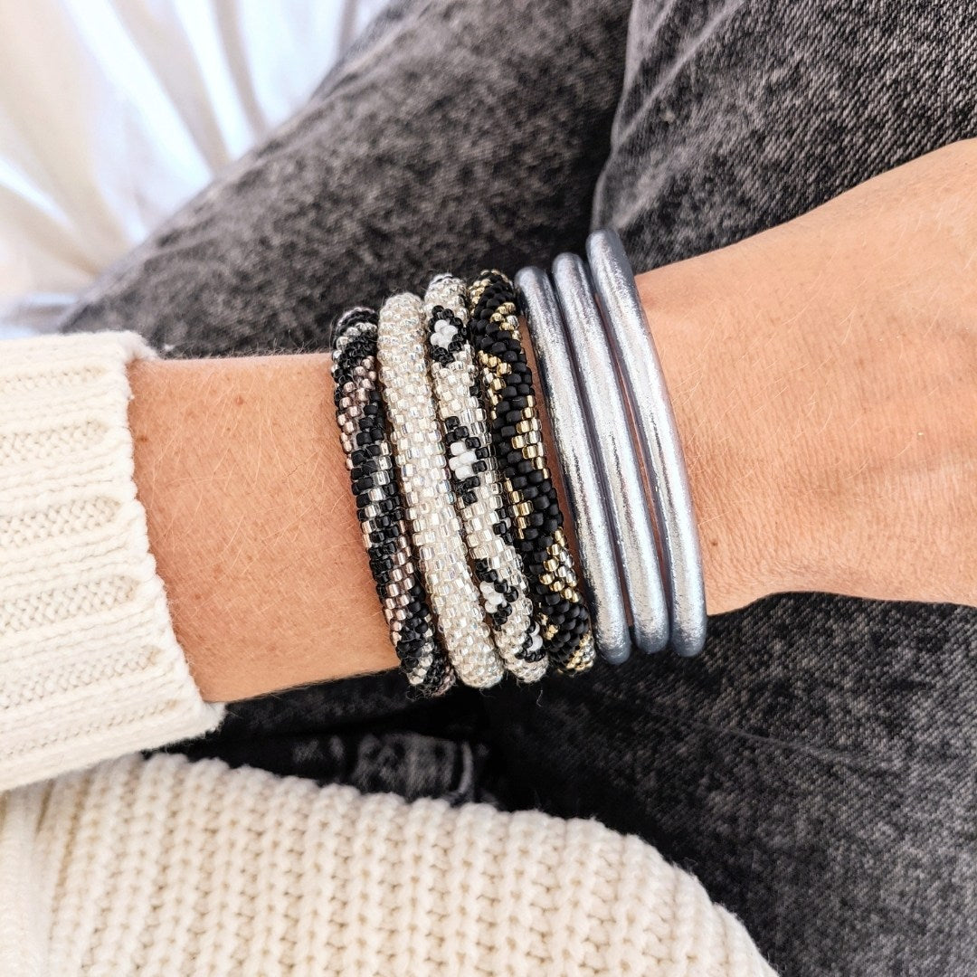 Bracciale nepalese #11 - Nero/oro e argento