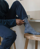 navy blue mottled men's sock Angarde worn stool