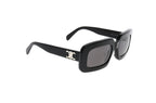 Luxury Eyewear – Sunglasses - Celine, black sunglasses with tinted lenses, set on a white background