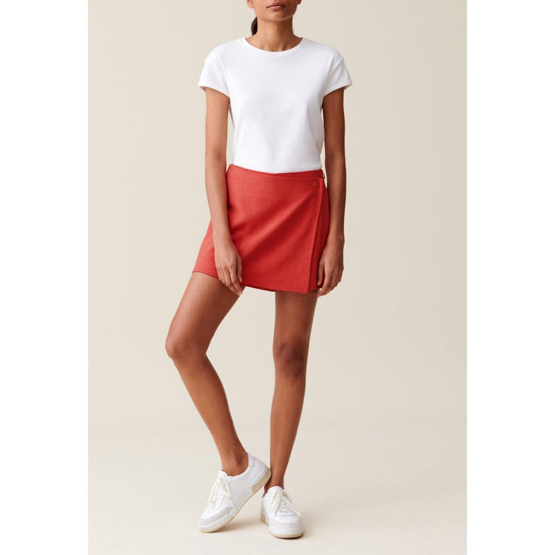 Pantalones cortos con falda cruzada