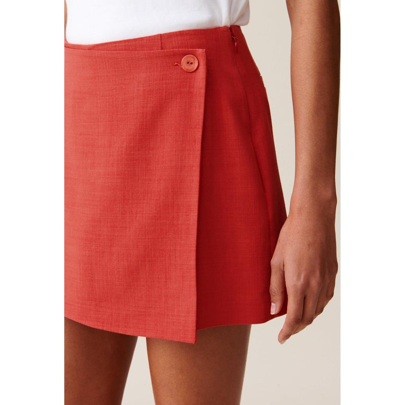Pantalones cortos con falda cruzada