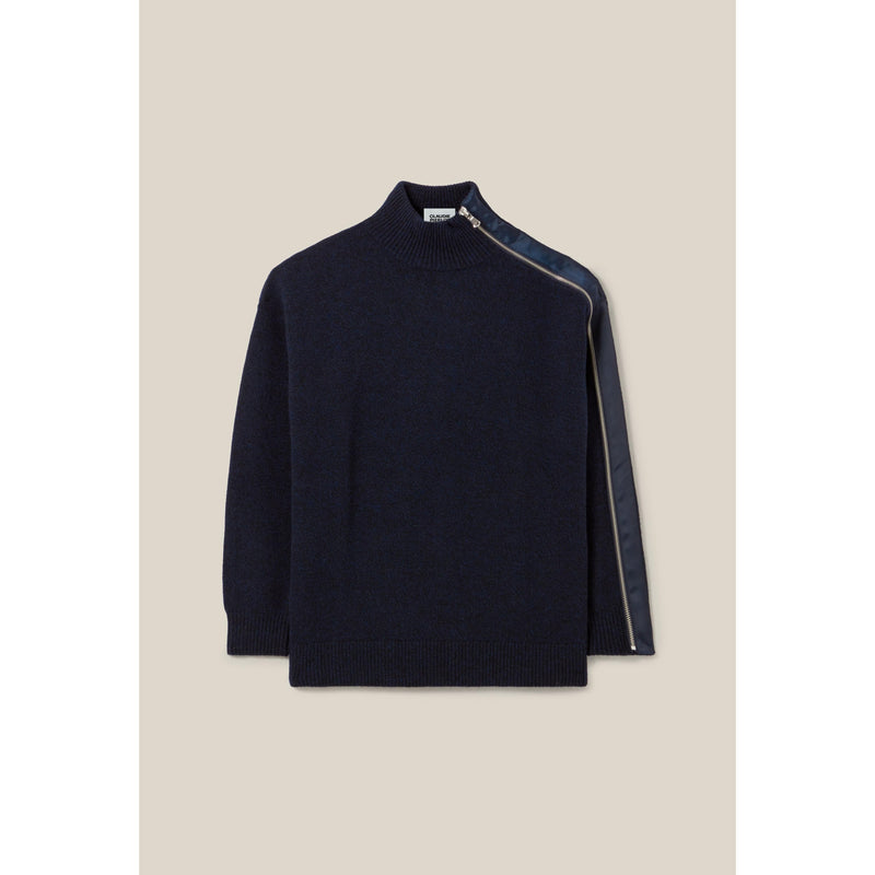 Jersey azul marino con cuello alto y cremallera