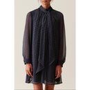 Vestido fluido con cuello tipo minifalda