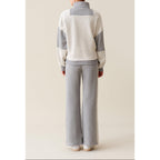 Sudadera con cremallera y cuello alto