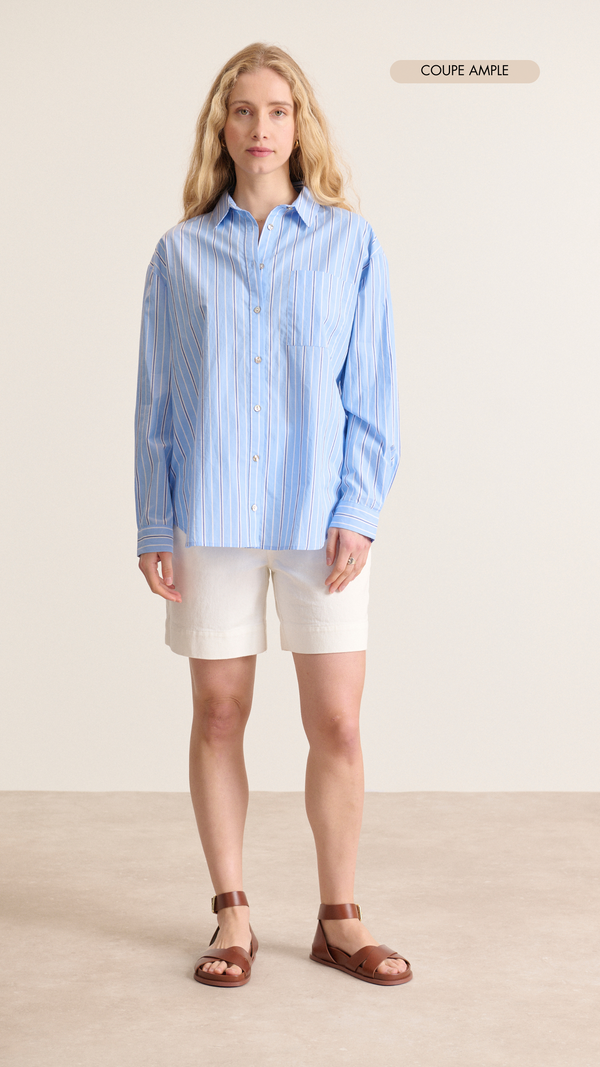 Chemise coton bleu à rayures avec manches longues boutonnées et poche à l'avant vêtement femme