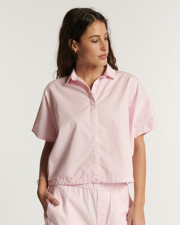 Women's jeans in light pink poplin, straight and comfortable cut, fine cotton material perfect for summer and all body types.