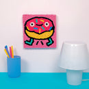 Tableau Donut OMY terminé – Création DIY avec pompons fluo 